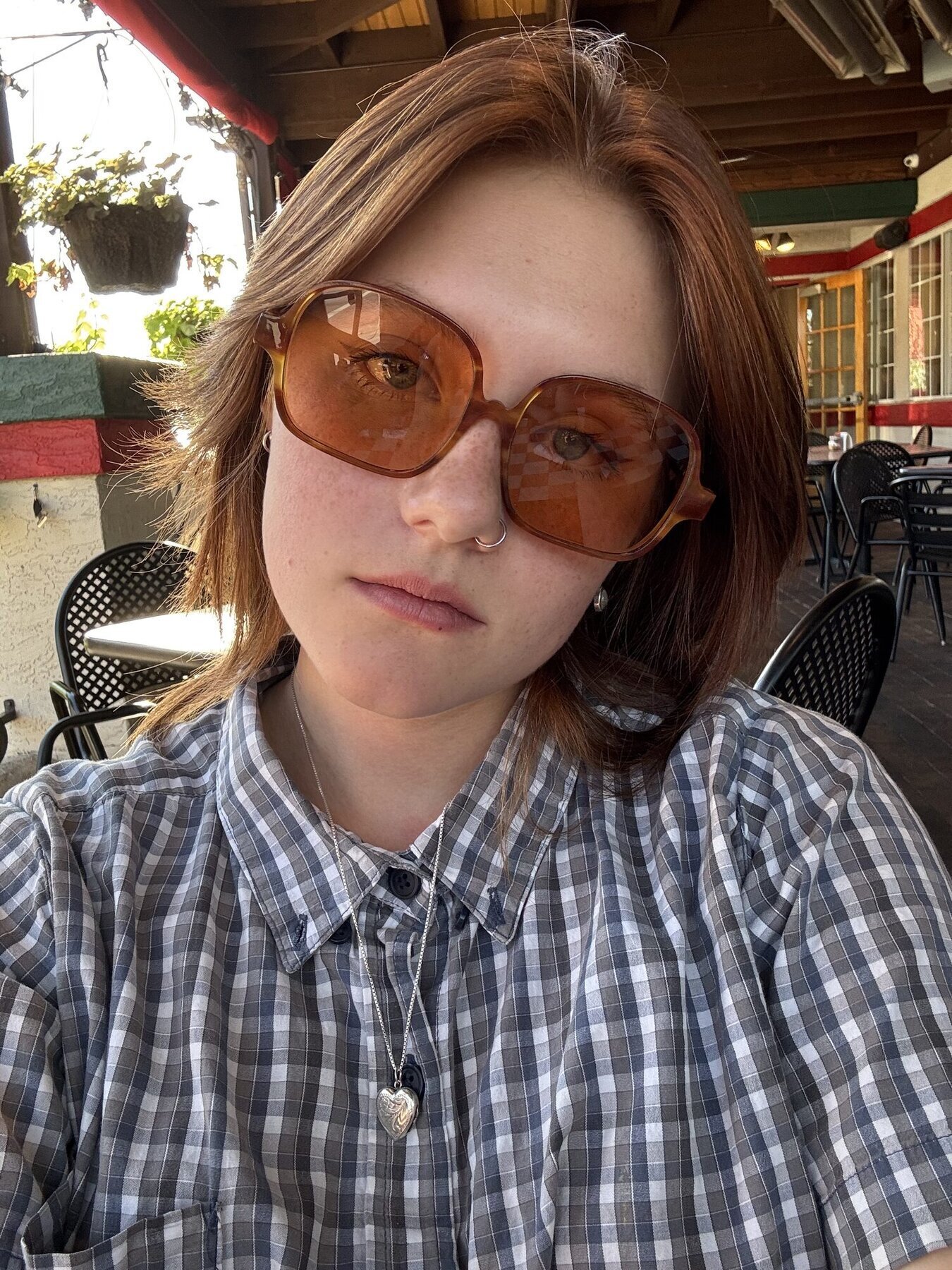 Portrait wearing finished sunglasses outdoors