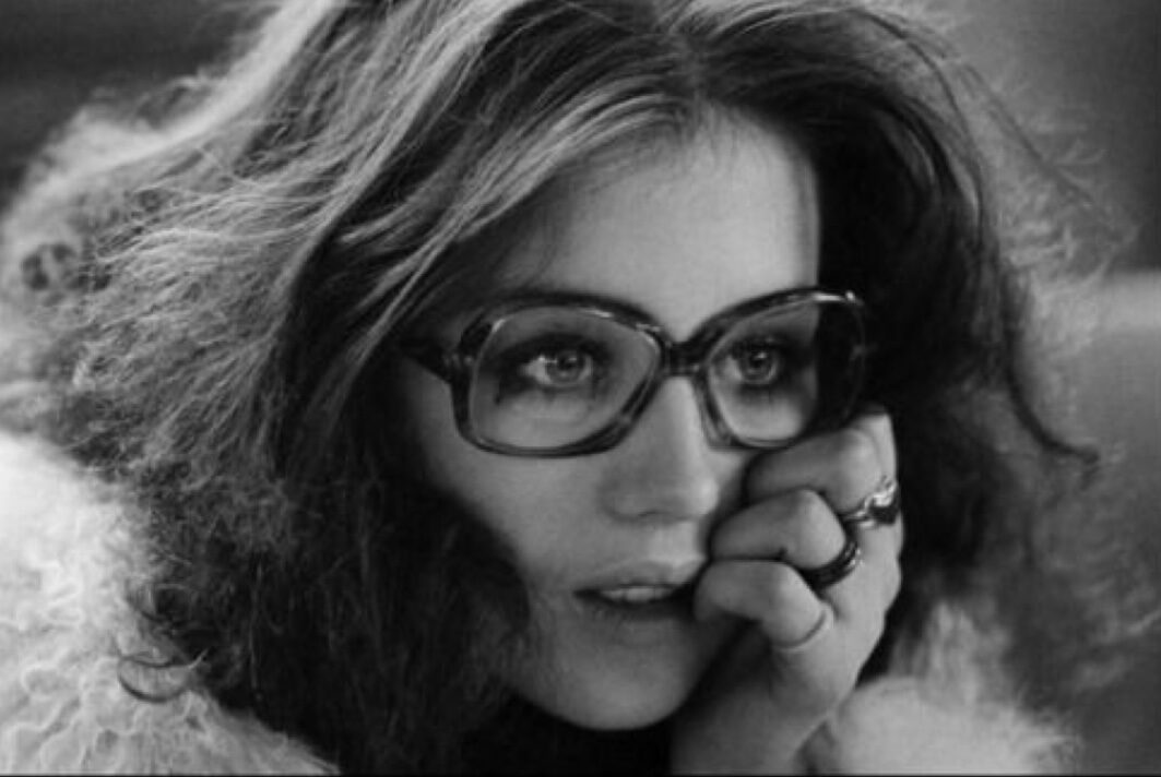 B&W close-up with oversized glasses