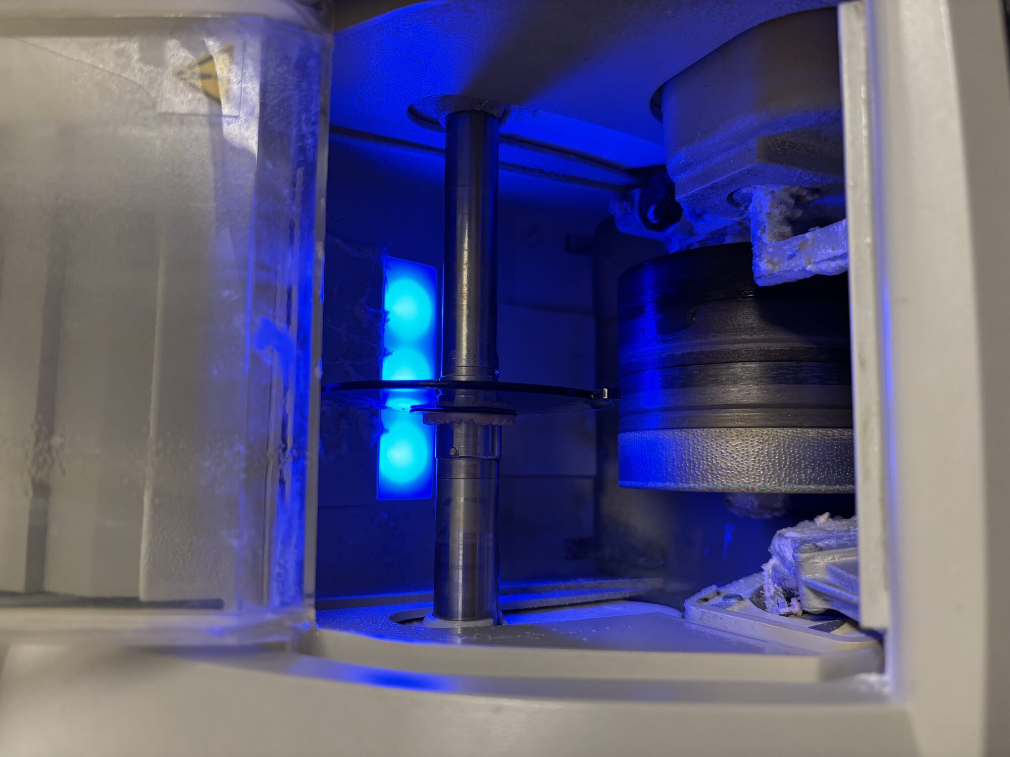 Lens cutting and sanding machine