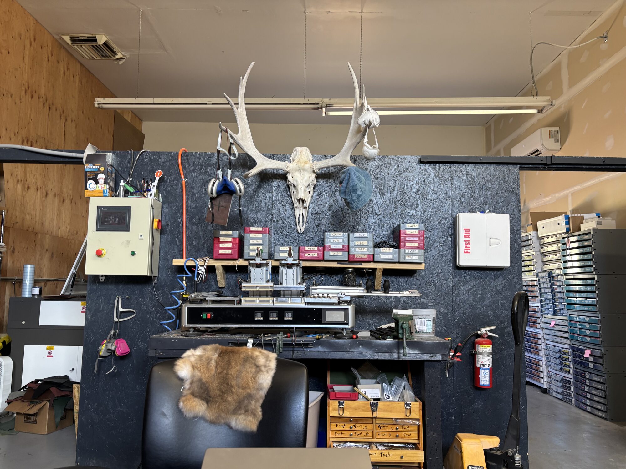 Workshop with machinery and antler mount